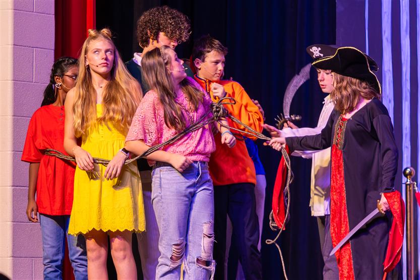 Woodland Middle students perform onstage